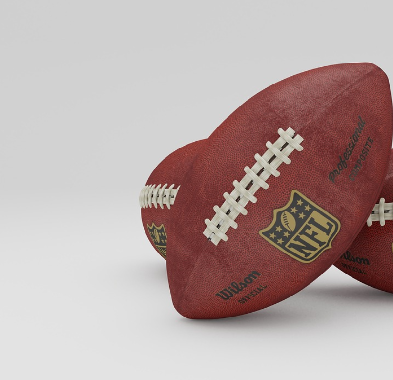 Fans placing live bets on NFL games using mobile apps during the season